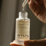 WYLYS Liquid V-Lift One-Step Serum Bottle in Hands When You Love Your Skin