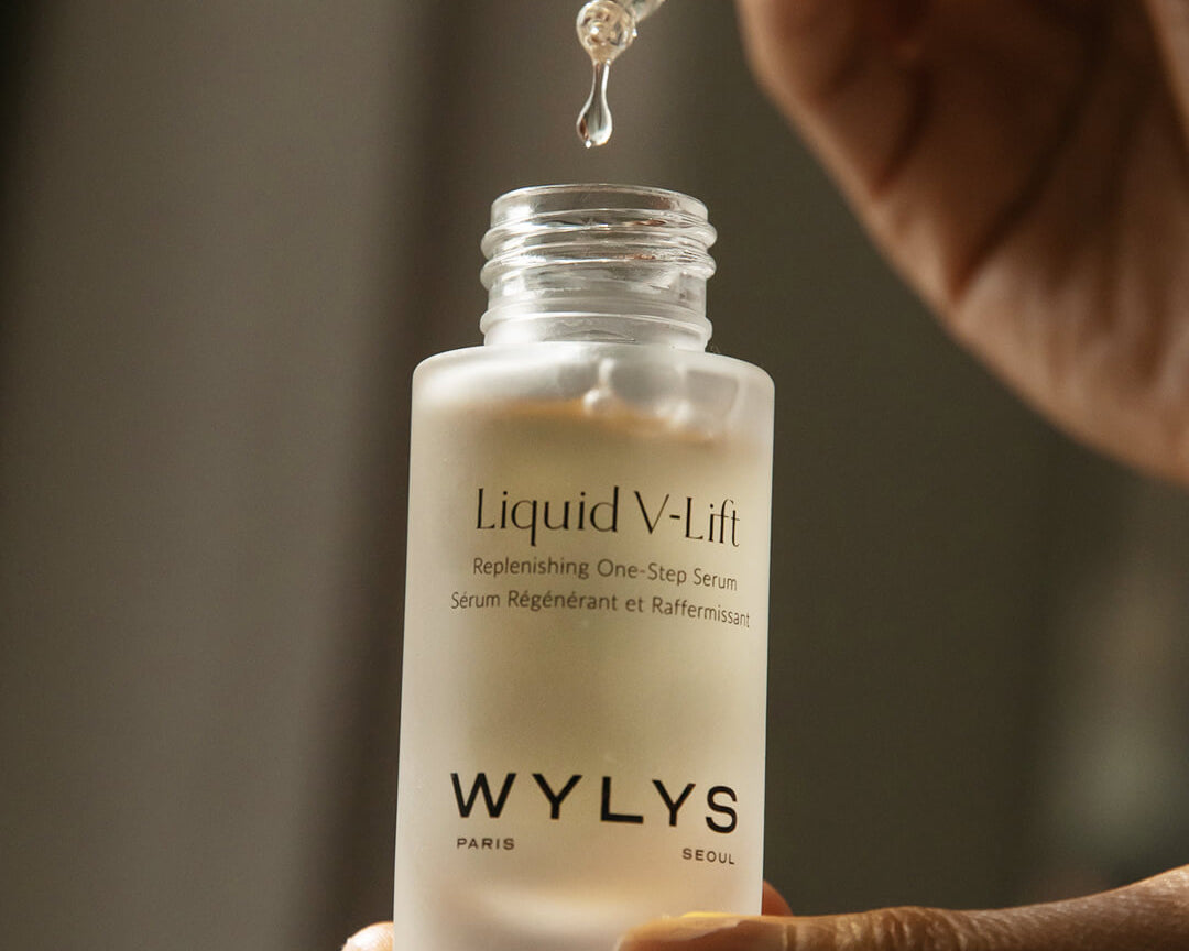 WYLYS Liquid V-Lift One-Step Serum Bottle in Hands When You Love Your Skin