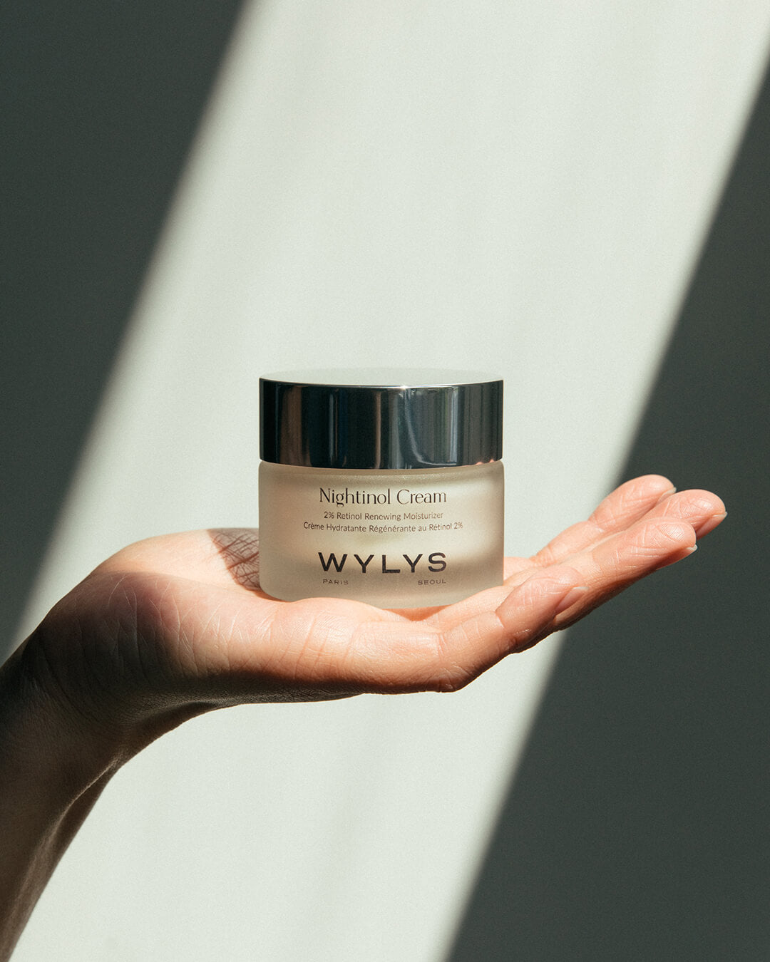 Wylys Nightinol Cream 2% Retinol Complex Nighttime Repair Cream Jar in Hand When You Love Your Skin