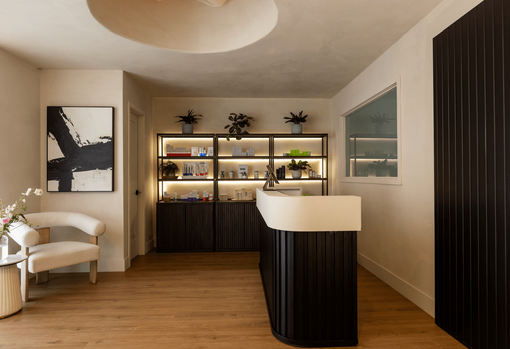Modern interior design of a day spa with a retail and reception area