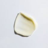 A smooth, creamy swatch of the WYLYS New Day Glow Vitamin C and Bakuchiol Brightening Pressed Serum.